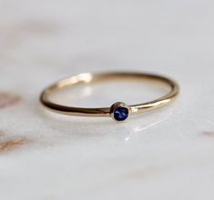 14K Gold Tiny Blue Sapphire Ring Blue Stone Ring Dainty | Etsy Adjustable Stackable Blue Sapphire Ring, Dainty Blue Sapphire Stackable Ring, Blue Sapphire Stackable Birthstone Ring, Everyday Stackable Blue Sapphire Ring, Everyday Blue Sapphire Ring In 14k Gold, Blue Stackable Rings With Bezel Setting, Stackable 14k Gold Blue Sapphire Ring, Stackable Blue Sapphire Ring In 14k Gold, Blue Sapphire Stackable Ring In 14k Gold