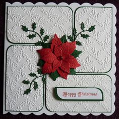 a christmas card with poinsettis and holly