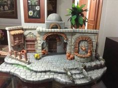 this is an image of a miniature house made out of clay