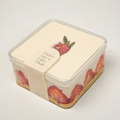 there is a container that has strawberries in it