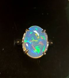 Beautiful Large Natural Opal Ring, 12.5x16mm Ethiopian Opal, See Video For Incredible Fire! 925 Sterling Silver Raised, Decorative Setting, Rhodium Plated,  Size 7. Velvet Box Formal Oval Opal Ring In Sterling Silver, Formal Sterling Silver Opal Cabochon Ring, Oval Sterling Silver Opal Ring Gift, Formal Sterling Silver Opal Ring Oval Cabochon, Formal Sterling Silver Opal Ring With Polished Finish, Formal Sterling Silver Opal Ring With Oval Cabochon, Formal Hallmarked Sterling Silver Opal Ring, Oval White Gold Opal Ring Gift, Fine Jewelry Sterling Silver Oval Opal Ring