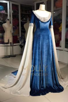 Blue Fitted Gown For Fancy Dress, Royal Style Fitted Fancy Dress, Elegant Blue Medieval Wedding Dress, Royal Fitted Fancy Dress, Fitted Royal Blue Dress For Costume, Royal Fitted Dress For Formal Occasions, Royal Costume Dresses, Royal Fitted Costume Dresses, Blue Fitted Bodice Dress For Fancy Dress