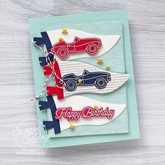 a birthday card with two cars on it