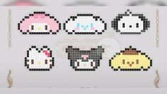 cross stitch patterns with cats and sheeps on them, including one in the middle