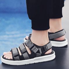 Stay on trend with the Grey Techwear Sandals Platform. These new fashion men's platform sandals are perfect for summer, featuring a casual and breathable design for your beach and outdoor activities. With a light and soft construction, plus a non-slip sole, these shoes are both stylish and practical. Explore our full collection of Techwear Sandals for even more stylish and versatile options.