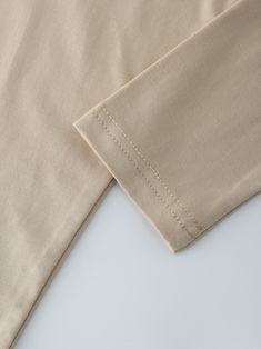 Introducing our Modal Dolman-Sand top! Made with modal fabric, this top is not only stylish, but also incredibly soft and comfortable to wear. Beige Stretch Top, Beige Stretch Top With Solid Color, Fitted Beige Plain Top, Stretch Khaki Tops For Loungewear, Stretch Viscose Tops For Loungewear, Beige Cotton Blouse For Loungewear, Khaki Cotton Top For Loungewear, Solid Viscose Tops For Loungewear, Taupe Stretch Long Sleeve Tops