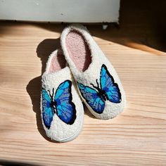 Introducing our Butterfly Effect Collection -House plush slippers. -Two Shades of Blue with Black Outline. -Butterfly effect collection. -Indoor Non-Slip Sole. -Closed toe. -EUR 36-37 / US 5.5-6 -EUR 38-39 / US 6.5-7 -EUR 40-41 / US 7.5-8 -EUR 42-43 / US 9.5-10 -EUR 44-45 / US 10.5-11 Comfortable Blue Slippers With Round Toe, Comfortable Blue Winter Slippers, Blue Round Toe Slippers, Comfortable Blue Indoor Slippers, Comfortable Soft Blue Slippers, Casual White Slippers For Home, White Casual Slippers, Casual White Home Slippers, Blue Comfy Slippers With Round Toe