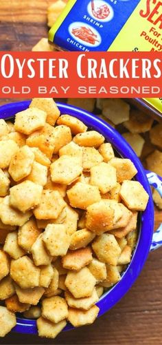 a blue bowl filled with cheesy oyster crackers next to a box of sea salt