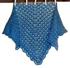 Description:  Large denim blue shawl made in medium weight acrylic yarn.    It is machine washable, but I always recommend hand washing for yarn items. If you insist on machine washing, at least place the item in a wash bag to avoid over-stretching and snagging. Approximate measurements: Tip to tip 78" Height 36" Handling time is 1-3 business days. Combined Shipping: Automatic combined shipping discount is 50% off each additional item with one combined payment. If you buy 3 or more items, I suggest you wait for a combined invoice, and I will try to give you a better deal, based on the weight and your zip code. Thank you for looking, and Happy Shopping! Crochet Shawl Wrap, Blue Shawl, Crochet Shawls And Wraps, Blue Crochet, Wash Bag, Shawl Wrap, Crochet Shawl, Zip Code, Wash Bags