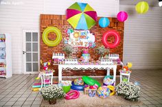 a birthday party with balloons and decorations