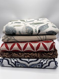 four different fabrics stacked on top of each other