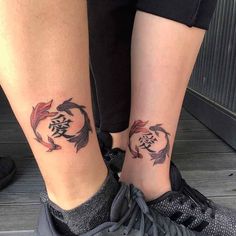 two people with matching tattoos on their legs