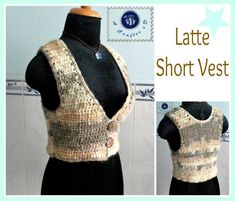 a crocheted vest with buttons on the front and back