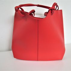 Neiman Marcus Women's Large Red Tangerine Vegan Leather Tote Handbag. Nwot. Approx. Measurement Details: H10" W5" L17" Strap Drop L: 13.5" Red Rectangular Bucket Bag With Large Capacity, Red Rectangular Large Capacity Bucket Bag, Red Large Capacity Rectangular Bucket Bag, Red Bucket Bag With Large Capacity And Top Handle, Red Rectangular Casual Bucket Bag, Casual Red Satchel With Large Capacity, Tan Bucket Bag With Adjustable Top Handle, Tan Bucket Shoulder Bag With Detachable Strap, Tan Shoulder Bucket Bag With Detachable Strap