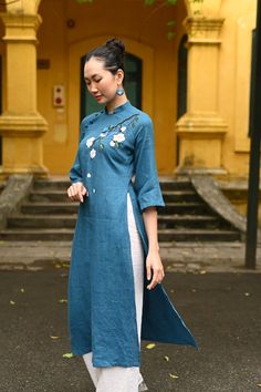 Traditional Spring Kurta With Embroidered Hem, Traditional Fitted Cotton Ao Dai, Traditional Long Kurta For Spring, Traditional Embroidered Cheongsam For Spring, Traditional Embroidered Spring Cheongsam, Summer Embroidered Long Sleeve Ao Dai, Traditional Embroidered Ao Dai, Traditional Straight Kurta Embroidered Dress For Spring, Traditional Embroidered Straight Kurta Dress For Spring