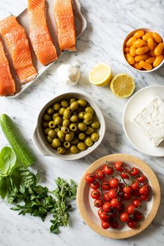 the ingredients to make this dish include olives, tomatoes, cucumbers, and fish