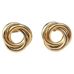 Vintage 14K Yellow Gold Twist Earrings - These captivating earrings feature intertwined links that are a stunning addition to any outfit. Weight: 1.6 dwt/ 2.3 g Size: 12.1 mm X 12.82 mm Hallmark: 14K Very good condition, professionally polished. Will come packaged in a gift box or pouch (when possible) and will be shipped U.S. Priority Mail Insured. AD122723/17KCS Gold Knot Earrings, Twist Earrings, Knot Earrings, Priority Mail, Jewelry Earrings, Twist, Yellow Gold, Drop Earrings, Yellow