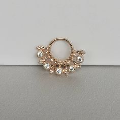 These 16 gauge hoops piercing are perfect for Septum ,Daith -Material: 925 Sterling Silver, Gold Plated, Rose Gold Plated over sterling silver -AAA Cubic Zirconia size: 2 x 2 mm -Hoop size: 8 x 8 mm inner -Gauge : 16 G - The approximate size is 15 mm (H) x 19 mm (w) ~This listing is for one sterling silver hoop piercing. **TWIST HOOP TO PUT IN** All items will be shipped with tracking number. Please note that delivery ranges between 1-4 weeks, depending on the country of destination. Thank you f Elegant Small Hoop Hypoallergenic Septum Ring, Elegant Hypoallergenic Small Hoop Septum Ring, Elegant Hypoallergenic Small Hoop Nose Rings, Internally Threaded Metal Hoop Septum Ring, Elegant Nickel-free Hoop Nose Ring, Internally Threaded Hoop Septum Ring For Wedding, Metal Hoop Nose Rings, Nickel Free Metal Hoop Septum Ring, Gift Internally Threaded Hoop Belly Rings