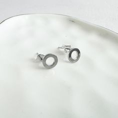 Simple and sophisticated, our minimalist stud earrings are beautifully plated in silver and perfect for everyday wear. · Silver plated brass · Push back closure · 8mm Minimalist Stud Earrings, Long Statement Earrings, Circle Stud Earrings, Minimalist Earrings Studs, Minimalist Studs, Circle Earrings Studs, Circle Studs, Gems Jewelry, Simple Earrings