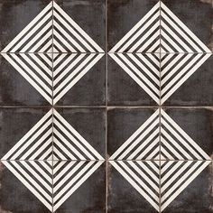 black and white tile with diamond shapes on it