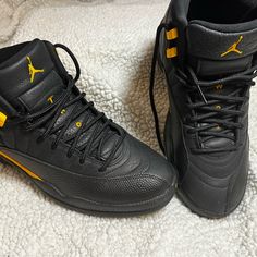 The Air Jordan 12 Retro ‘Black Taxi’ (Style Code: Ct8013-071) Are Classic Sneakers Celebrated For Their Iconic Design, Premium Materials, And A Colorway That Exudes Both Timeless Style And A Nod To The World Of Basketball. The ‘Black Taxi’ Color Scheme Is Characterized By A Combination Of Black And White, Creating A Clean And Sporty Look. The Upper Of These Air Jordan 12 Retros Is Meticulously Crafted From Premium Materials, Often Featuring Leather And Suede, Ensuring Both Style And Durability. One Of The Standout Features Of The ‘Black Taxi’ Is The Iconic Design Of The Air Jordan 12, With Its Distinctive Mudguard, Reptile-Textured Overlay, And Metallic Eyelets. The Black And Whi Classic Black Basketball Shoes With Boost Midsole, Classic Black Jordan Shoes For Sports, Black Leather Basketball Shoes With Cushioned Footbed, Leather Jordan Shoes With Cushioned Footbed, Black Lace-up Jordan Shoes For Sports, Classic Leather Jordan Shoes, Black Leather Basketball Shoes With Laces, Classic Black Lace-up Basketball Shoes, Classic Black Jordan Shoes With Contrast Sole