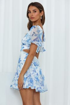 Length from shoulder to hem of size S: 71cm. Blue white print mini dress. Lined. Cold hand wash only. Model is a standard XS and is wearing size XS. True to size. Non-stretchy woven fabric. Tie-up back. Invisible & normal back zipper. Polyester. Book a ticket and it's time to have a vacation, we suggest Destination Floral. This adorable mini is fabulously backless, with short sleeves and a fit-and-flare design. Style yours with mules and soft waves. Floral Dress Blue, Marine Uniform, Chiffon Floral, Sequin Prom Dresses, Prom Dress Shopping, Green Prom Dress, Satin Prom Dress, Dreamy Dress, Pink Prom Dresses