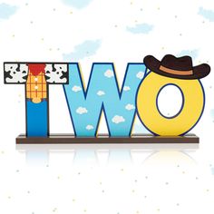 the word tow with a cowboy hat on it's head sits in front of a white background