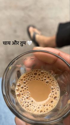 a person holding a glass with liquid in it and the caption says, i love you