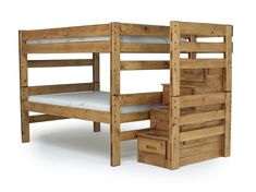 a wooden bunk bed with stairs next to it and storage drawers on the bottom level