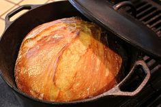 a loaf of bread in a skillet on the stove