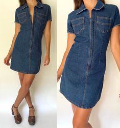 Late 90s or early 2000s denim mini-dress.  Super cute 70s inspired look! Comfortable stretch denim with a cool zipper closure down the front. Made by Santa Barbara Clothing Co.  Size on tag is 7. Model is a size 2-4.  Please refer to measurements by comparing them to a similar item of yours as modern sizing can differ. Made of 65% cotton, 32% polyester and 3% spandex. In perfect condition! Measurements are taken with the garment lying flat and doubled for circumference. Shoulder width : 16" Bust circumference (measured pit to pit) : 36" Waist circumference : 29" Length top to bottom : 32.5" DISCOUNTS :  20% off orders of two or more items  (not applicable if already on sale). Message me before buying for a discount code and combined shipping!  Message me if you have any questions :) Trendy Denim Mini Dress With Short Sleeves, Medium Wash Short Sleeve Denim Dress, Fitted Short Sleeve Denim Dress, Denim Blue Short Sleeve Mini Dress, Fitted Medium Wash Denim Dress With Short Sleeves, Fitted Denim Mini Dress With V-neck, Summer Short Sleeve Fitted Denim Dress, Trendy Medium Wash Short Sleeve Mini Dress, Trendy Medium Wash Mini Dress With Short Sleeves