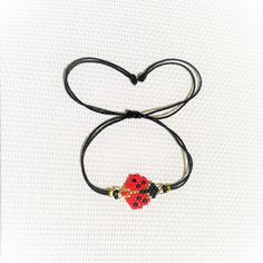 Spring is here and we found a ladybug for you so you can have some extra good luck Handmade from miyuki beads on adjustable black string and safe to get wet Comfortable sizes for everyone Lovingly handmade in USA ♡ Miyuki Bracelet, Miyuki Beads, Spring Is Here, Lucky Charm, Handmade Bracelets, Unique Gifts, Beaded Bracelets, Beads, Gifts