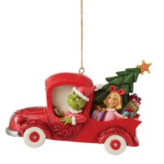 a christmas ornament with an image of the grin and mrs claus on it