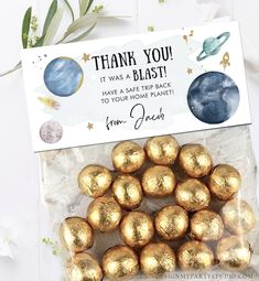 a bag of gold foiled chocolate eggs with the words thank you, it was blast