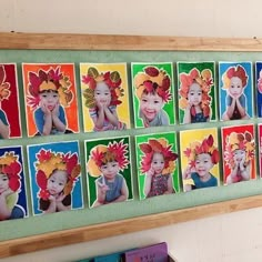 a group of children's pictures hanging on a wall