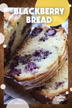 a loaf of blackberry bread with white frosting on top and the words, black berry bread