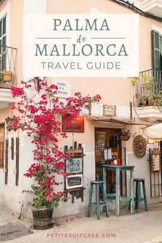 a pink building with flowers growing out of it's windows and the words palm de mallorca travel guide