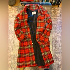 This Pendleton Coat Is Perfect For Brightening Up The Dark Days Of Winter! The Textile Is Wool In A Cheerful Red Plaid, And This Coat Is Fully Lined. This Style Has A Button Front, Long Sleeves, Two Front Pockets, And One Decorative Pocket. Fabric: Wool Closure: Buttons Label: Pendleton Condition: Excellent Era: 1950s Classic Red Outerwear, Fitted Vintage Red Outerwear, Vintage Plaid Outerwear For Formal Occasions, Vintage Plaid Formal Outerwear, Vintage Red Wool Outerwear, Red Vintage Wool Outerwear, Vintage Fitted Plaid Outerwear, Fitted Vintage Plaid Outerwear, Retro Red Wool Outerwear