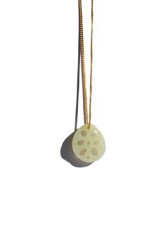 Necklace Nephrite Untreated Lotus root jade pendant necklace is a celebration of this holiday season as a symbol of harmony and unity. Featuring an adjustable gold-plated S925 silver box chain, the lotus root pendant necklace adds a subtle pop of green to any outfit. It's great for everyday wear as well as a gift for your loved ones. Natural and untreated nephrite. Made by handwork of carving and polishing. Because of the gemstone’s natural characteristics, each piece may vary slightly in colors Lotus Root, Jade Pendant Necklace, Jade Necklace, The Lotus, Silver Box, Jade Stone, Green Necklace, Jade Pendant, Fashion Accessories Jewelry