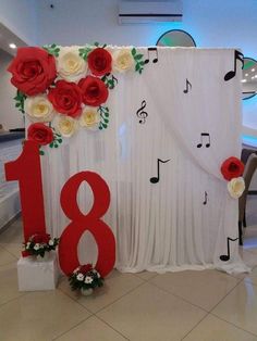 a decorated stage with flowers and musical notes