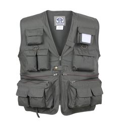 Uncle Milty’s Travel Vest is the ultimate travel vest with more pockets than you will know what to do with. This vest is ideal for travel, camping, fishing, or EDC. The vest features 13 front pockets, 3 inside pockets, and a back cargo pocket with side zipper closure for maximum storage when traveling to your next destination. Made of comfortable yet durable 55% cotton / 45% polyester material, this photographer vest is ideal for any climate. Rothco’s fishing vest has three D-rings with two atta Photographer Vest, Photography Vest, Leather Badge Holder, Travel Vest, Fishing Vest, Outdoor Vest, Utility Vest, Mens Fashion Rugged, Tactical Vest