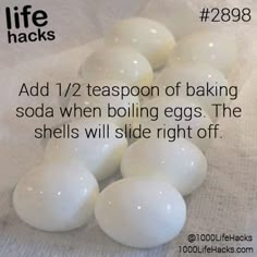 white eggs sitting on top of each other with the words life hacks