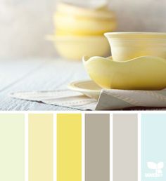 the color scheme is yellow and gray, with some white dishes on top of each other