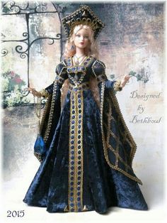 a doll is dressed in blue and gold