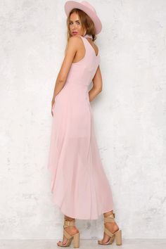 You'll be the picture of elegance in the Ballerina Twirl Maxi Dress thanks to its classic silhouette and gorgeous high-low chiffon-esque skirt. There is a hidden zipper on the back. Wear it with nude heels and a messy bun. Dress. Lined. Cold hand wash only. Model is standard XS and is wearing XS. True to size. Non stretchy fabric. Polyester. Pink Long Dress, A Messy Bun, The Ballerina, Dresses Chiffon, Chiffon Maxi, Chiffon Maxi Dress, Nude Heels, Dresses Women, Women Long Dresses