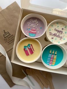 the birthday cupcakes are decorated with candles