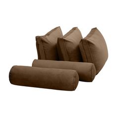 three brown pillows sitting on top of each other