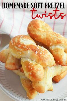 homemade soft pretzels on a white plate with text overlay that reads homemade soft pretzel twists