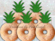 three donuts with pineapples on them