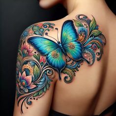 the back of a woman's shoulder with a blue butterfly tattoo on her upper arm